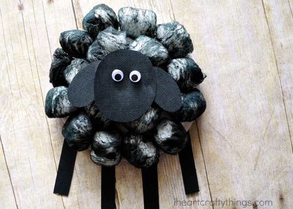 Close up image of finished cotton ball black sheep craft.