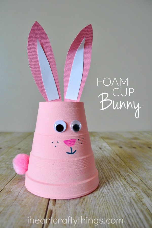 Vertical close up image of bunny craft with the words "Foam Cup Bunny" in the middle right side of the photo.