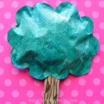 close up image of tree craft made out of newspaper and cardboard.