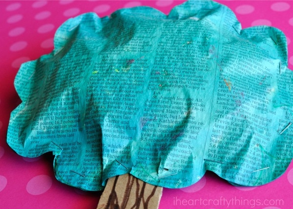 Close up image of puffy newspaper tree craft.