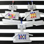 This craft stick robot craft for kids is a fun and creative craft for kids. Fun kids craft, preschool craft and summer kids craft.