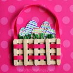 This mini Easter basket craft made from craft sticks is such a cute Easter kids craft, popsicle stick craft and spring kids craft.
