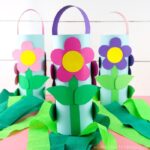 close up front angle photo of three flower windsocks