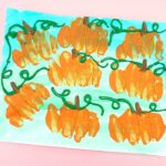 Gorgeous pumpkin patch art project for kids to make. Fun fall art projects for kids, pumpkin crafts and pumpkin art project.