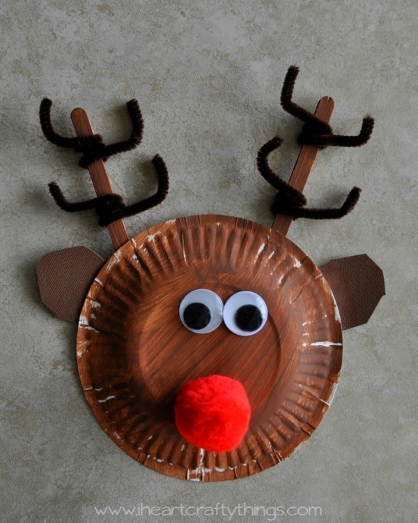 Close up image of a child's paper plate reindeer craft.