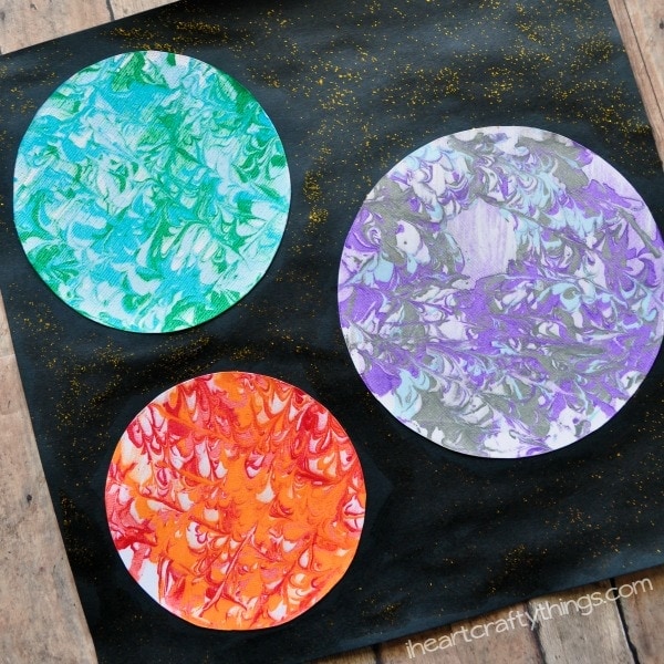 Replicate the surface of planets with this preschool space craft using a unique marbled painting technique!