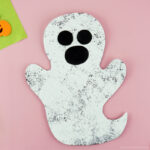Square close up image of completed sponge painted ghost craft.