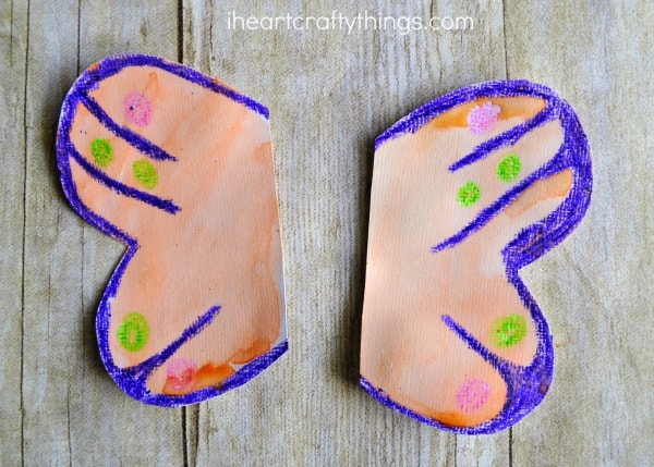 What the butterfly wings look like after coloring them with crayon designs and painting them with watercolors.