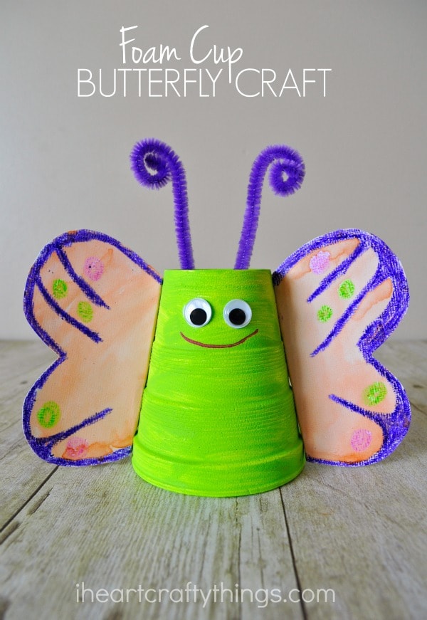 Vertical image of green and purple butterfly craft with the words "Foam Cup Butterfly Craft" in the top center.