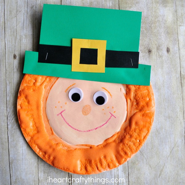 Square image of finished puffy paint leprechaun craft.