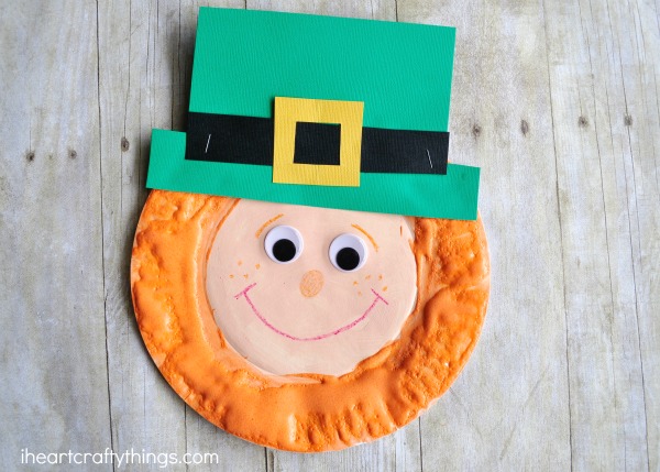 Horizontal image of finished puffy paint leprechaun craft.