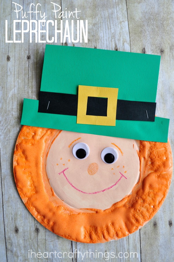 Vertical image of finished St. Patrick's Day craft with the words "Puffy Paint Leprechaun" in the top left corner.