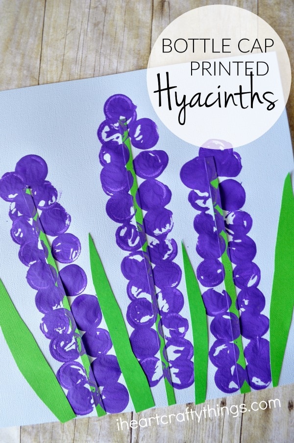 Vertical image of completed flower craft with the words "Bottle Cap Printed Hyacinths" in the top right corner.