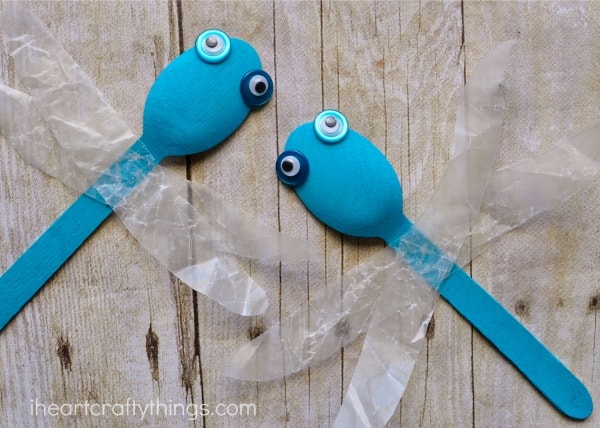 close up image of two dragonfly crafts with their heads close to each other.