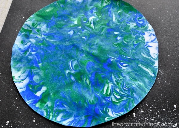 close up image of how the marbled effect looks on the earth day craft