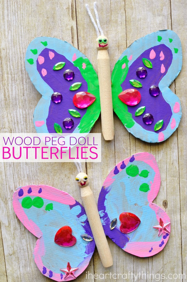 vertical image of two butterfly crafts made out of cardboard and wood peg dolls.