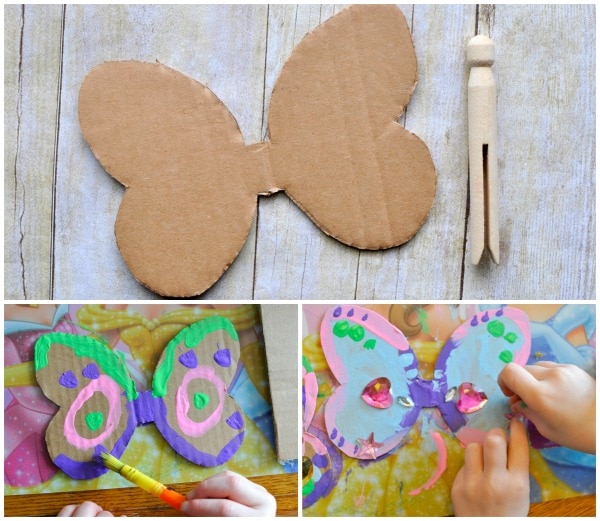 child painting their cardboard butterfly wings.