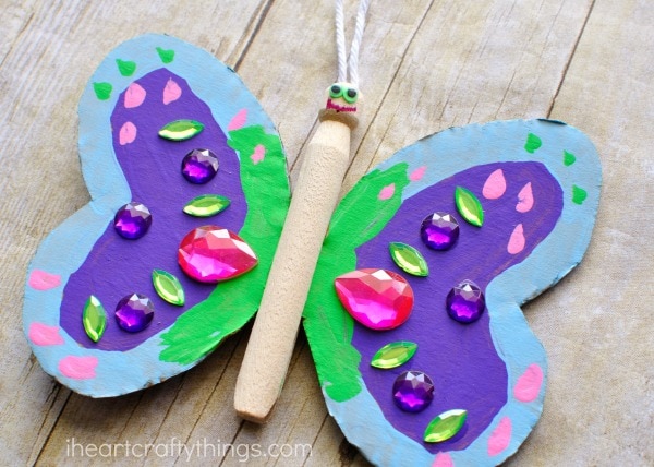 close up image of wood peg butterfly craft.