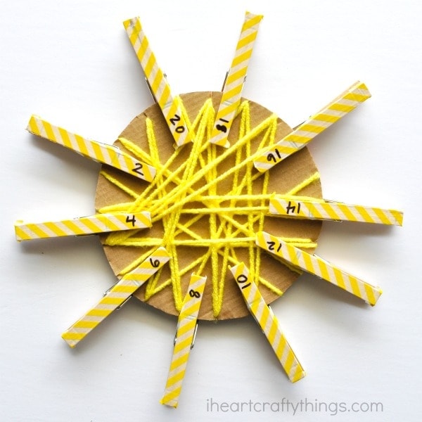 If you are looking for a fun activity for your preschooler this summer that also incorporates learning, this yarn wrapped sun craft is perfect! This learning activity is great for working on fine motor skills, math and skip counting.