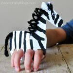 This galloping finger puppet zebra craft is so fun for kids to make and kids will love playing with their zebra craft by making it gallop around the house. Fun animal crafts for kids, zebra craft, zoo crafts, summer kid crafts, preschool crafts and play based learning activity for kids.