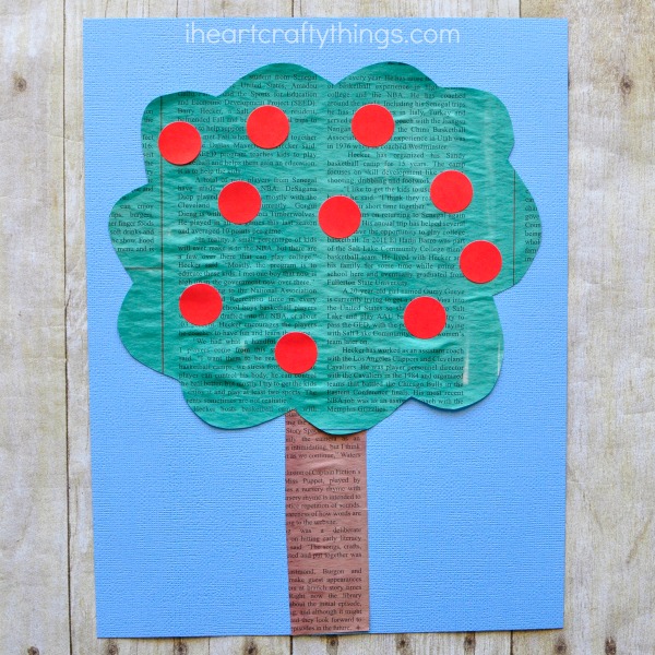 This simple painted newspaper apple tree craft is perfect for a preschool apple theme and fall kids craft. Fun apple craft for kids, recycled newspaper craft, preschool craft and fall craft for kids.