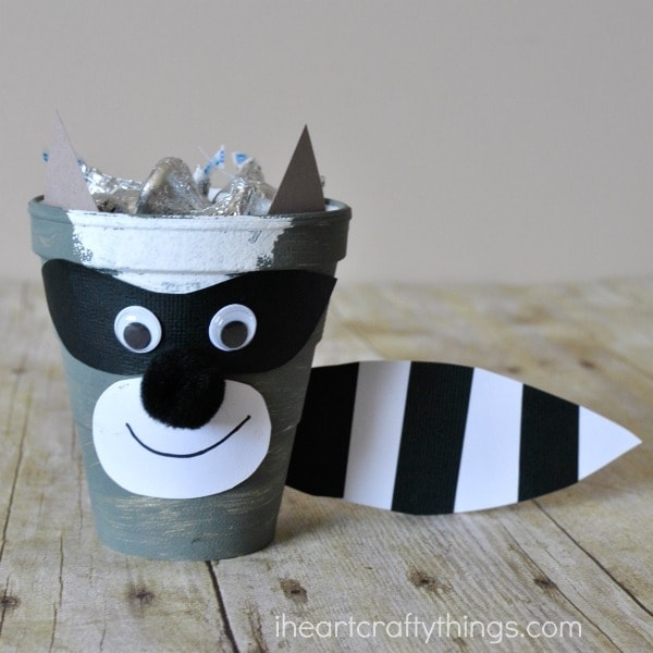 This cute The Kissing Hand Raccoon Craft is perfect as a back to school kids craft and turns into a fun treat container that can be taken to school to hand out kisses to classmates. Or if you are a teacher you might love to incorporate it for the first day of school after reading The Kissing Hand.