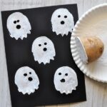 All you need is some paint, cardstock paper and a potato to make this cute and spooky potato stamp ghost craft. Fun Halloween kids craft.