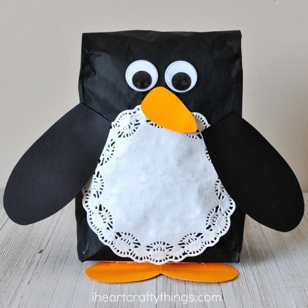 This stuffed paper bag penguin craft is adorable and makes a great winter kids craft, preschool craft and winter animal craft for kids.