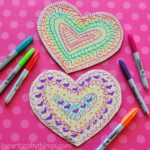 This tin foil heart Valentine's Day craft is shiny and colorful and makes a fabulous craft for kids of all ages. Fun toddler craft, preschool craft and Valentine's Day crafts for kids.
