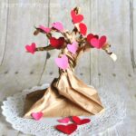 Pretty Valentine Heart Tree Craft that goes along with the book The Day it Rained Hearts. Fun Valentine's Day Craft for kids.