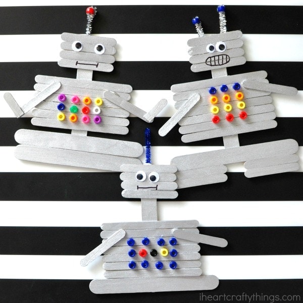 This craft stick robot craft for kids is a fun and creative craft for kids. Fun kids craft, preschool craft and summer kids craft.