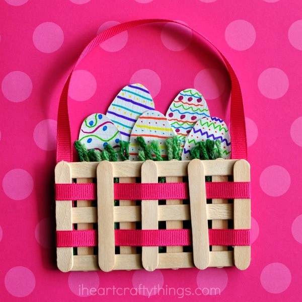 This mini Easter basket craft made from craft sticks is such a cute Easter kids craft, popsicle stick craft and spring kids craft.