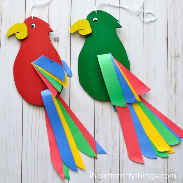 Colorful and fun twirling parrot craft for kids. Great bird craft for a jungle theme unit, fun kids crafts and jungle crafts for kids.