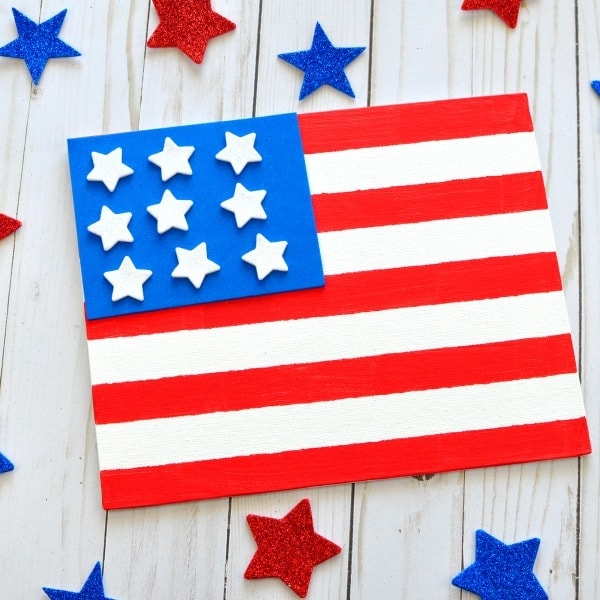 Get toddlers involved in arts and crafts by making this tape resist painting Fourth of July Craft. Fun last minute Fourth of July activities for kids.