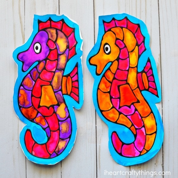 This seahorse black glue craft is a great ocean art project for kids, fun seahorse craft for kids, ocean kids craft and fun summer art project.