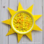 This paper plate sun craft makes a perfect summer sewing craft for kids, summer kids craft, beginning sewing craft for kids and paper plate summer crafts.