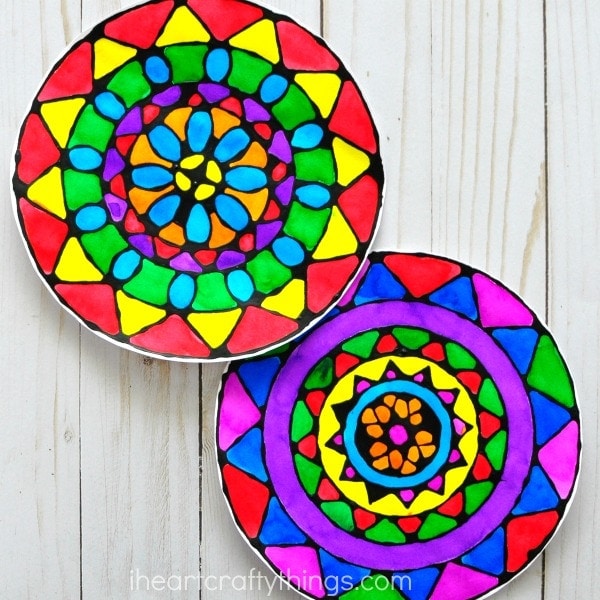 Gorgeous black glue mandala art project for kids with templates. Fun summer kids craft, art projects for kids, black glue art and process art for kids.