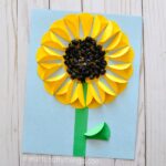 Gorgeous folded paper sunflower craft that makes a perfect summer kids craft, fun flower crafts for kids and paper crafts for kids.