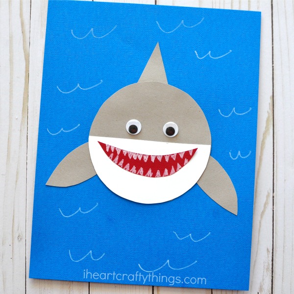 Here's a simple and cute paper shark craft kids will love making for Shark Week. Fun shark week activities for kids and ocean craft for kids.