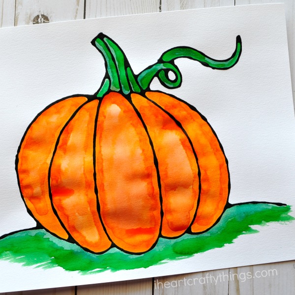 Beautiful black glue pumpkin art project for kids. Great fall kids craft, fall art projects, pumpkin craft and fall crafts for kids.