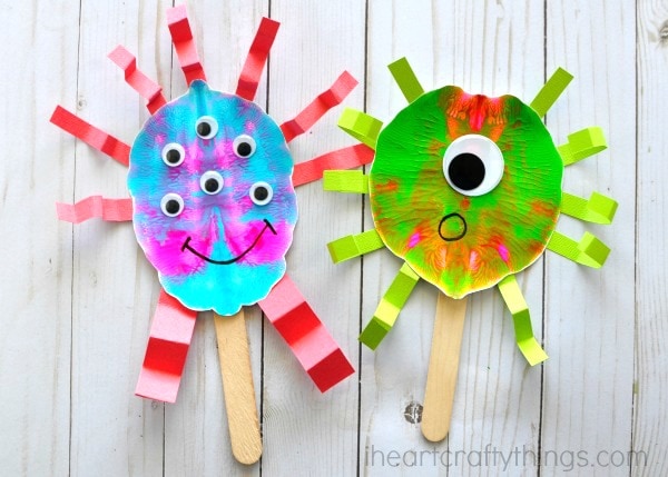 These fun paint smash monster puppets are a great book inspired craft for kids for a monster-themed book. Fun monster craft and kids process art activity.