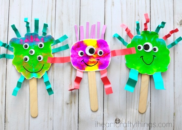 These fun paint smash monster puppets are a great book inspired craft for kids for a monster-themed book. Fun monster craft and kids process art activity.