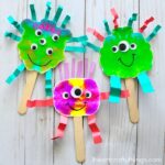 These fun paint smash monster puppets are a great book inspired craft for kids for a monster-themed book. Fun monster craft and kids process art activity.