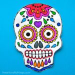 This sugar skull black glue art project is a fun way to celebrate Day of the Dead and Dia de los Muertos. Fun Day of the Dead kids craft.