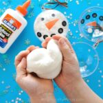 Simple glittery snow slime recipe to make for a fun winter activities for kids. Elmer's glue slime recipes, snowman activities for kids.