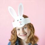 This DIY Bunny Headband Craft is a simple and perfect Easter craft for kids to make during a playdate, family get-together or for an Easter celebration at school. After making the adorable headband kids can have fun hopping around, pretending to be bunnies and giggling in their cute DIY bunny headband.