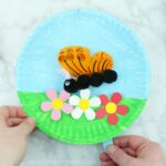 Kids will not only love the creative process of making this paper plate fluttering butterfly craft but afterwards they will have a blast getting to play with it, watching the butterfly flutter along the paper plate. Great spring craft and summer craft for kids.