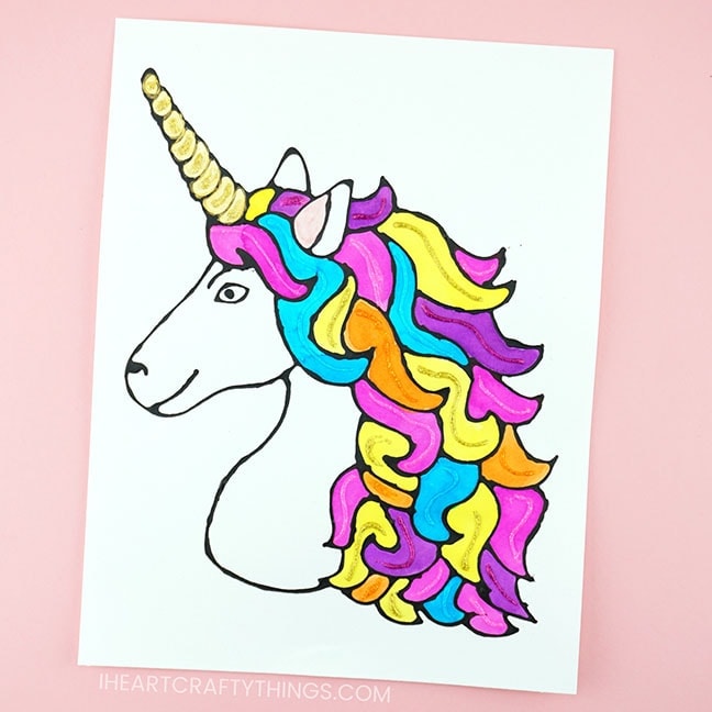 Kids will love making this black glue unicorn art project. A colorful art project for kids for unicorn fans and perfect for a summer afternoon art project.