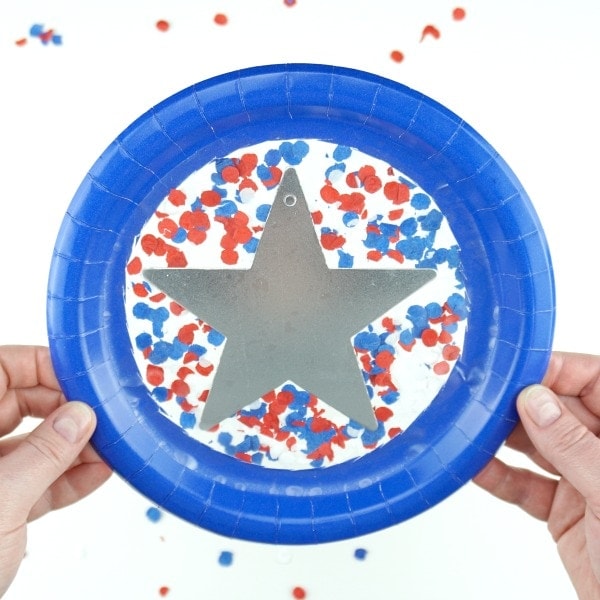 This paper plate patriotic suncatcher craft is perfectly festive for Independence Day and kids will have a blast making it. Great Fourth of July kids craft.