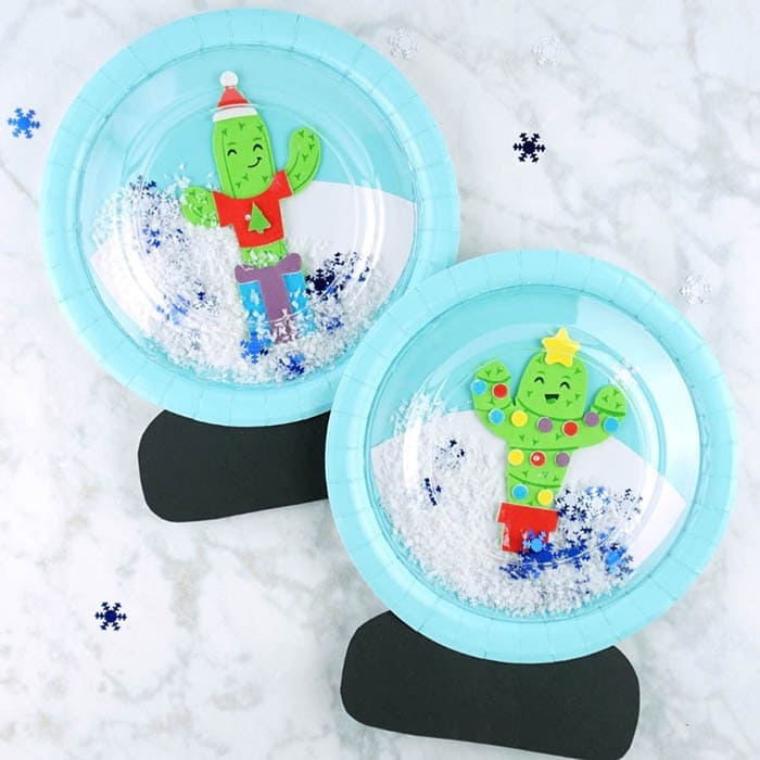 This paper plate snow globe craft is so much fun for kids to play with. The wintery theme makes it a great Christmas craft or winter kids craft.